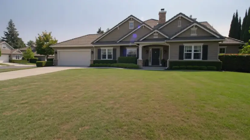 Front yard transformed with AI landscape design showing lush modern plantings and clean hardscape